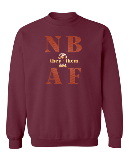 Maroon sweatshirt with orange text on a white background