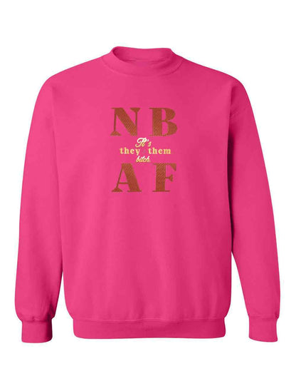 Pink sweatshirt with gold text on a white background